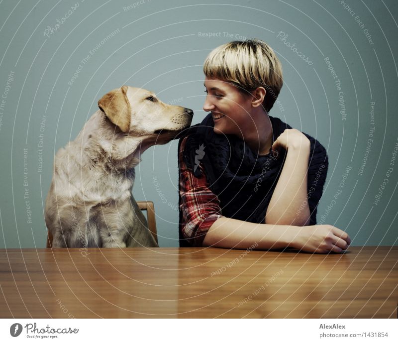 Say, do you come here often? -Blond Labrador with blond woman at the table - they look into each other's eyes Wooden table Bar Cocktail bar