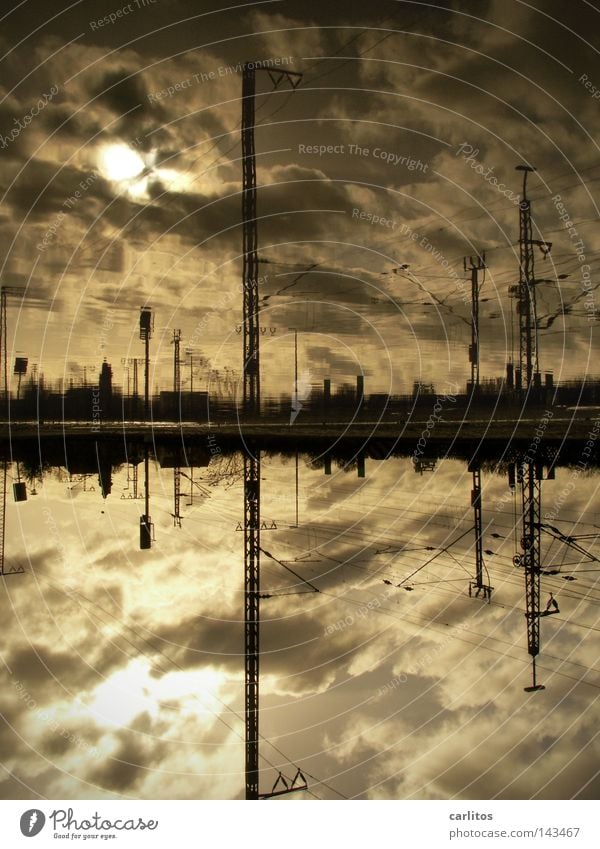 Atlantis needs electricity | CO2 Apocalypse Platform Rush hour Commuter Puddle Reflection Back-light Overhead line Electricity Railroad tracks Clouds Dramatic