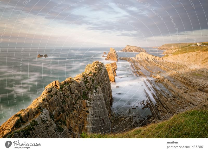 remoteness Human being Stage play Nature Landscape Water Sky Clouds Horizon Sunrise Sunset Sunlight Weather Beautiful weather Grass Hill Rock Waves Coast Reef