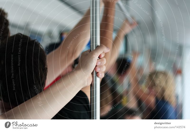 Snuggle up after work Colour photo Detail Copy Space right Shallow depth of field Human being Crowd of people Means of transport Rush hour Railroad