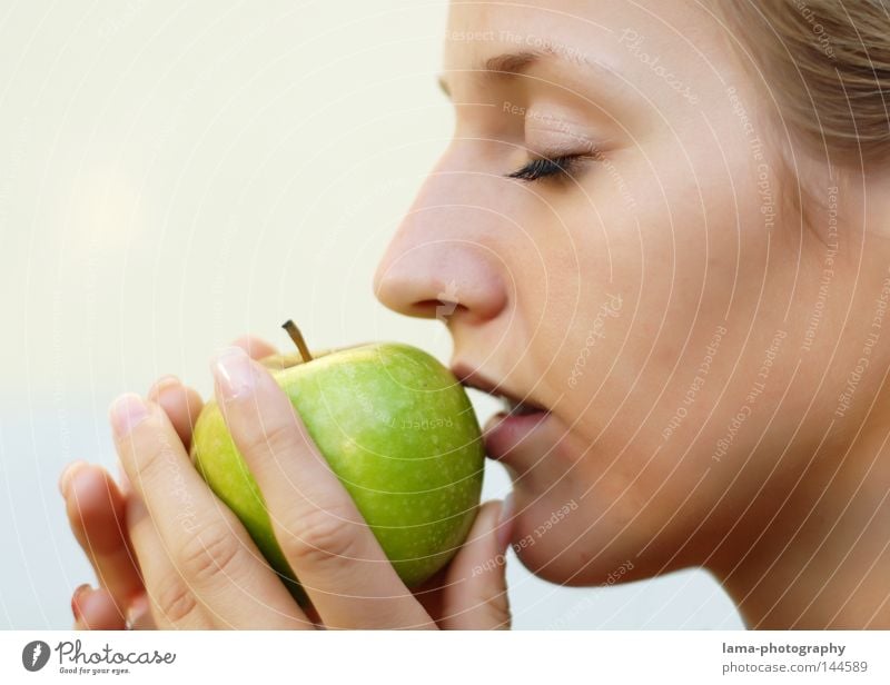 senses Apple tree Green Food Vitamin Vitamin C Life Delicious Nutrition Sense of taste Fresh Touch Woman Portrait photograph Lips Hand Senses Kissing Caresses