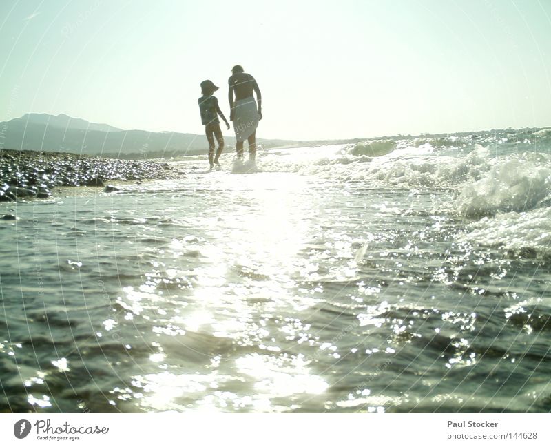 ocean Ocean Kos Greece Human being Water Sun Waves Beach Lake River Drops of water Girl Woman Mother Child Happiness Summer Swimming & Bathing Light Coast Stone