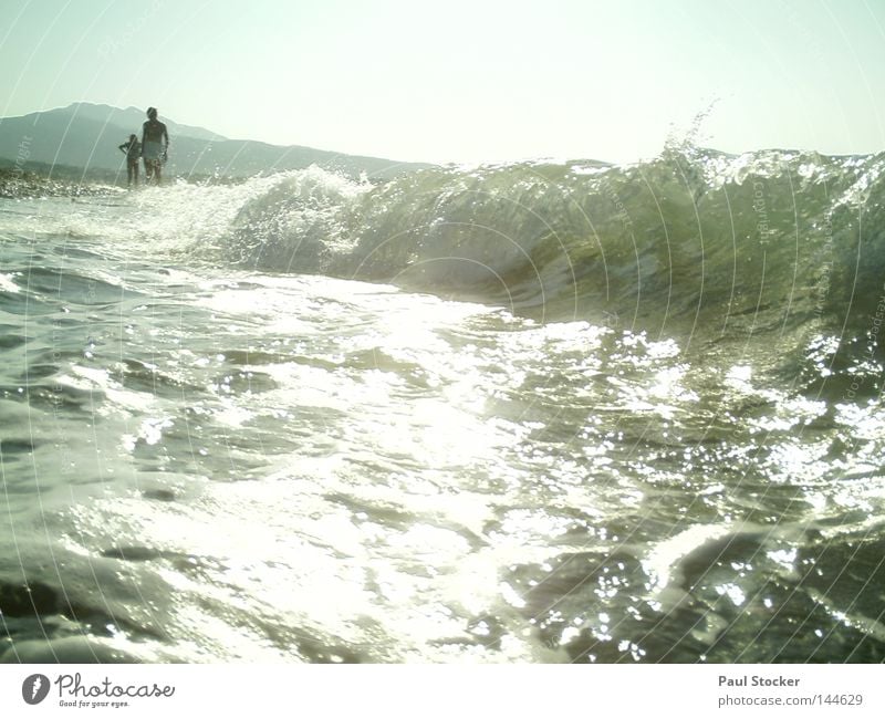 shaft Ocean Water Waves Sun Light Human being Greece Kos Beach Lake River Drops of water Girl Woman Mother Child Happiness Summer Coast Swimming & Bathing