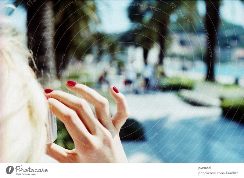 the fingers! Fingers Nail polish Vacation & Travel Take a photo Depth of field Palm tree Water Woman Red Blonde Joy Summer