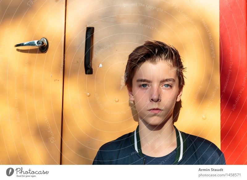 portrait of a teenage boy in front of a yellow door Lifestyle Style Beautiful Summer Human being Masculine Youth (Young adults) Head 1 13 - 18 years