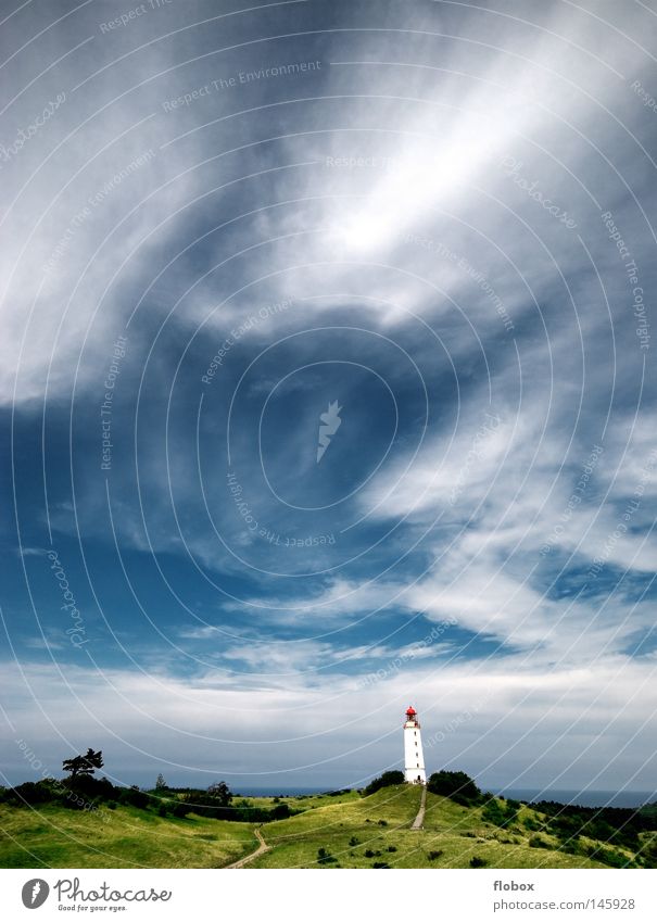 Standing Tall II Lighthouse Beacon Lake Ocean Light signal Rügen Hiddensee Navigation Dangerous Waves Green Clouds Gale Hurricane Lookout tower Meadow Dornbusch