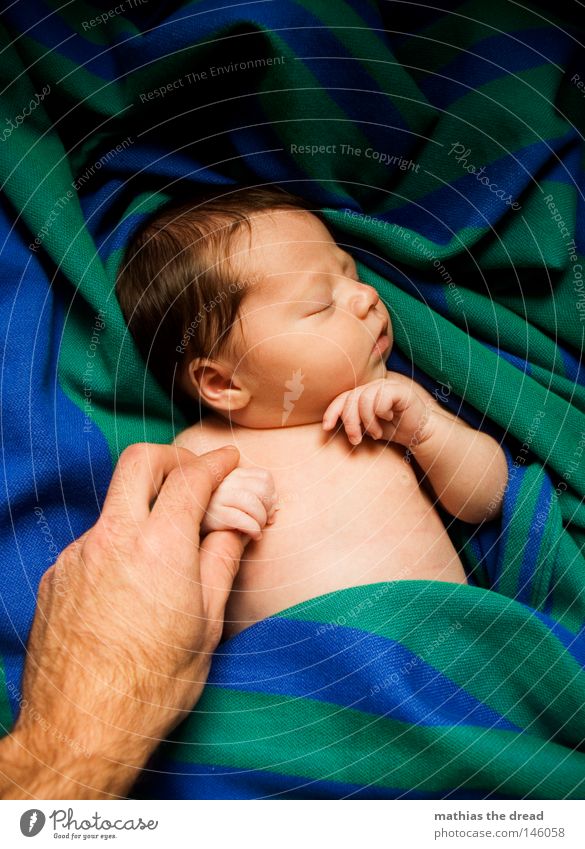 first contact Baby Newborn Offspring Portrait photograph Face of a child Sleep Dream Calm Peaceful Contentment Men`s hand Father Profile Closed eyes Cute