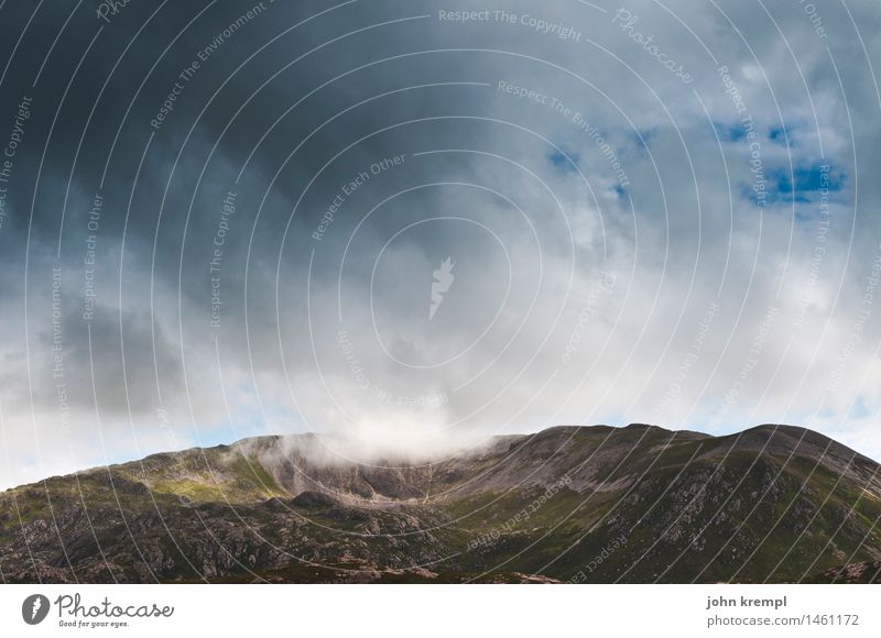 touch the sky Sky Clouds Storm clouds Rock Mountain Scotland Highlands Threat Dark Protection Safety (feeling of) Sadness Longing Wanderlust Anger Aggravation