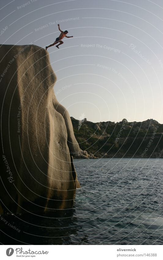 a big step Jump Water Brave Tall Man Human being Ocean Sky Waves Stone Rock Granite Hop Release Free Liberate Sardinia Extreme sports cliff jump cliff diving