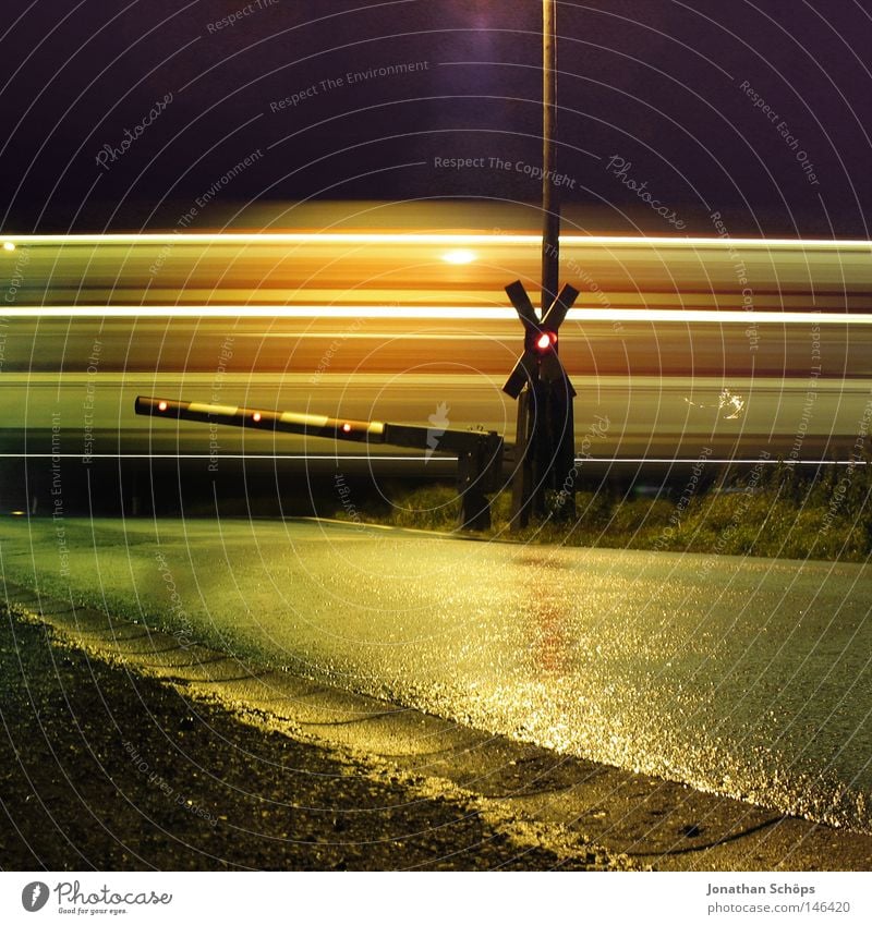 Level crossing Barrier Train passing by Long-term exposure at night luck Calm Racecourse Logistics Train station Transport Means of transport Street