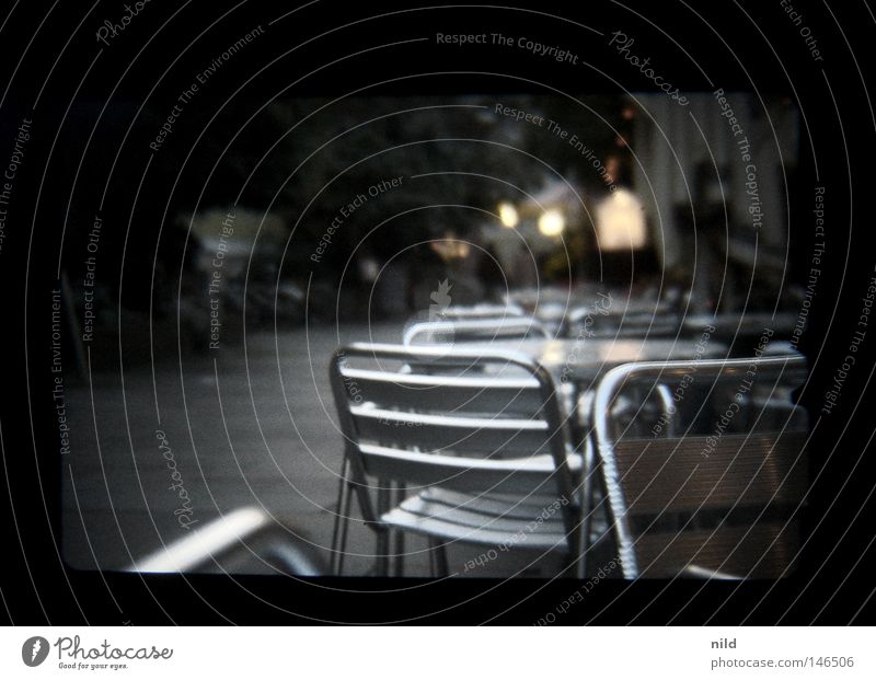 Analog Digital - Street Café Empty Autumn Cold Evening Munich Sidewalk café Table Chair Calm Comfortless Pedestrian Viewfinder Blur Traffic infrastructure