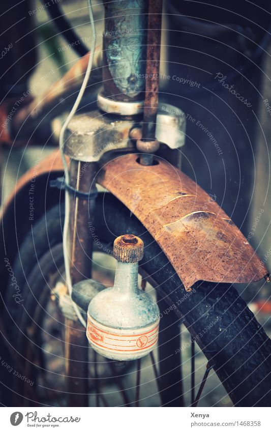 Retro bicycle front tire Metal Rust Brown Black Bicycle Bicycle frame Guard Bicycle tyre Nostalgia Exterior shot Deserted Day Shallow depth of field