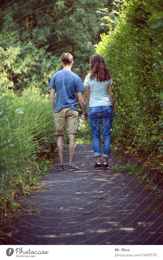 Time stands still Young woman Youth (Young adults) Young man Couple Partner 2 Human being Environment Nature Plant Bushes Garden Park Lanes & trails T-shirt