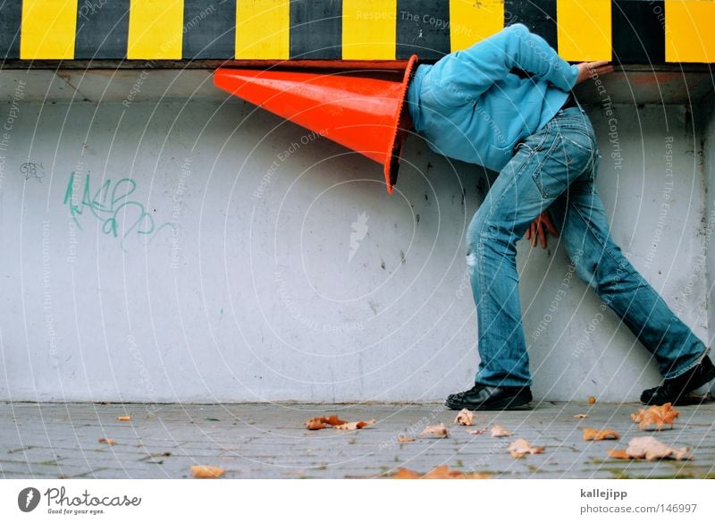 striped cap Man Human being Mushroom cap Headwear Red Construction site Hat Playing Barefoot Wall (building) Crash barrier Transport Whimsical Crazy Foreign