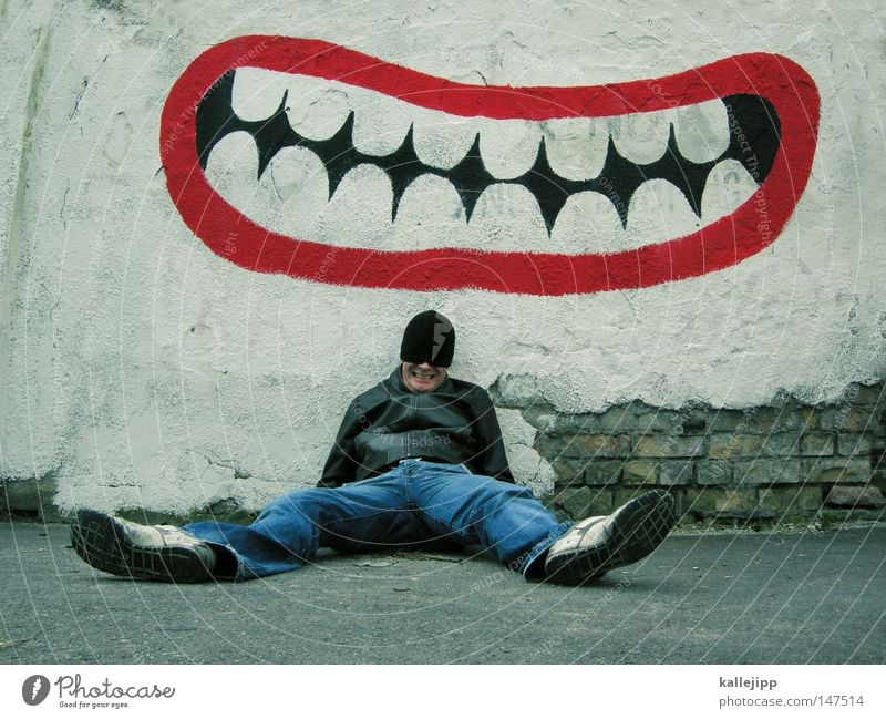 don't grin so stupid! Grinning Laughter Humor Joke Sounds of levity Graffiti Inscription Mouth Teeth Dentist Dental Funster Joker Man Human being Sit Lean