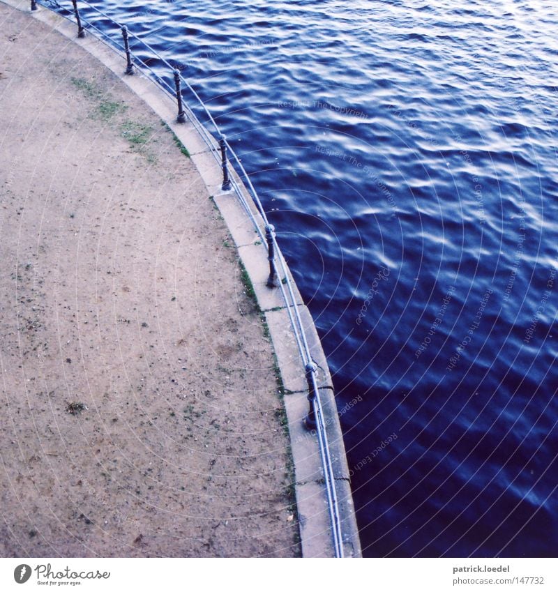 Alster Lake Wet Flow Swing Arcade Sidewalk Promenade Jetty River Water Blue Arch Stone Handrail Sand Lanes & trails