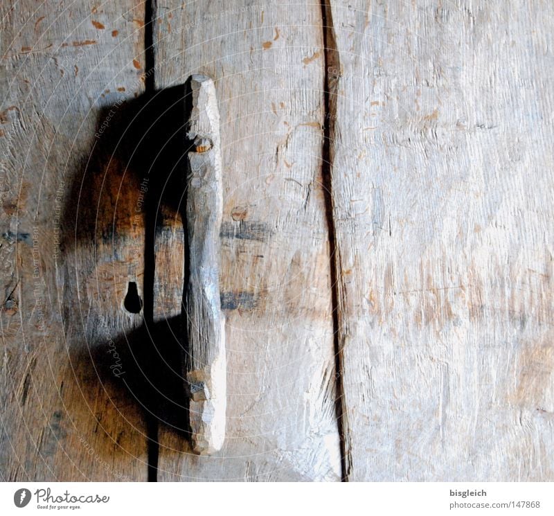 wooden door Colour photo Exterior shot Detail Deserted Copy Space right Door Wood Old Brown Transience Door handle Door lock Wooden door Closed Derelict Day