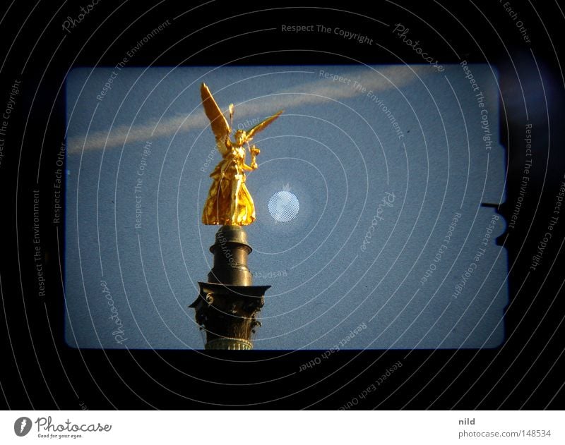 Isarstadt (analogue-digital) Sky Sky blue Vapor trail Symmetry Viewfinder Statue Bavaria Landmark Monument Angel anlog Digital photography cinematically