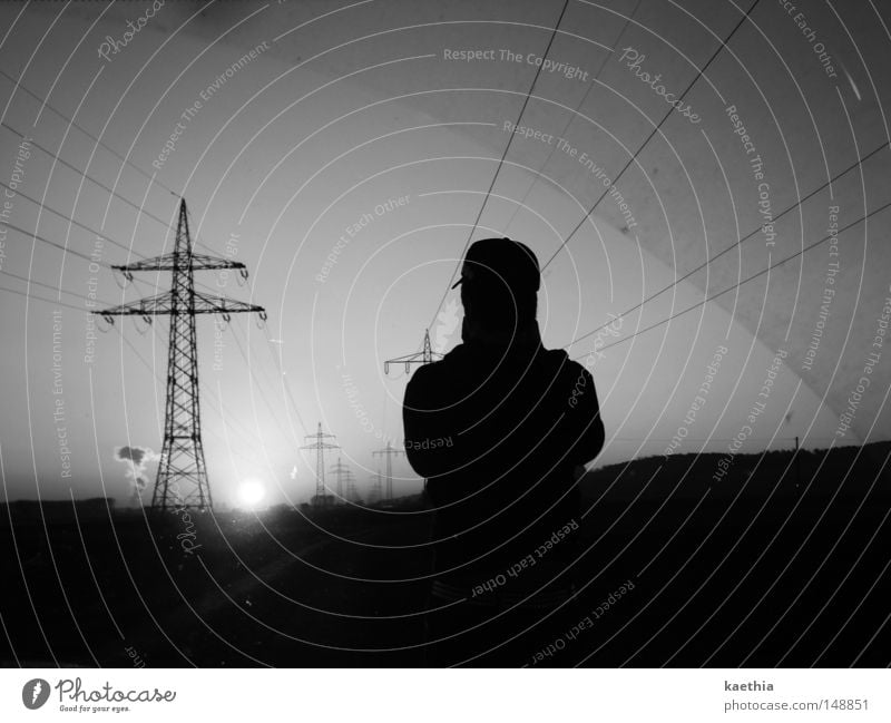 unknown sun worshipper Sun Man Adults Line Dark Energy Electricity pylon Contrast Sky Environment Technology Energy industry Silhouette Black & white photo