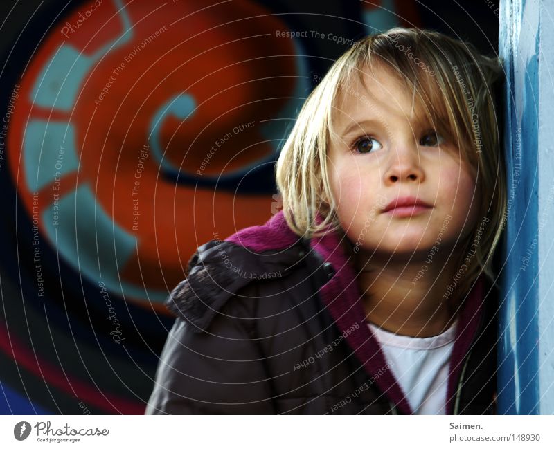 always these photographers Beautiful Face Child Girl Jacket Graffiti Think Sadness Gloomy Boredom Lean Wall (building) Anorak Strand of hair Exasperated Posture