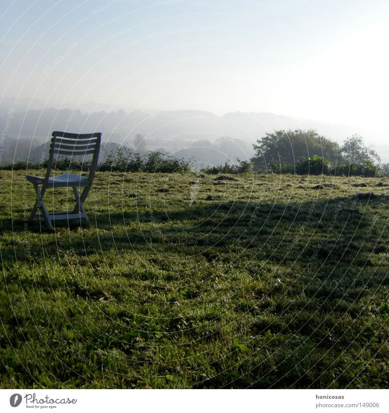 haze Armchair Chair Folding chair Camping chair Backrest Fog Haze Vantage point Shadow Meadow Grass Lawn Bushes Clouds Loneliness Calm Autumn France