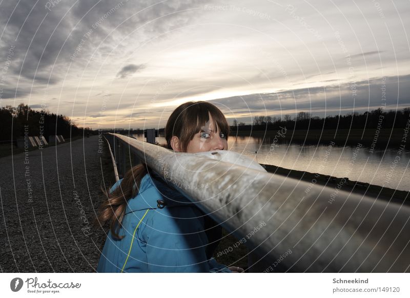 ? Woman Lady Evening Tree Lake River Lanes & trails Munich Autumn Sunset Shadow Flash photo Clouds Sky Face Handrail Brook Hair and hairstyles