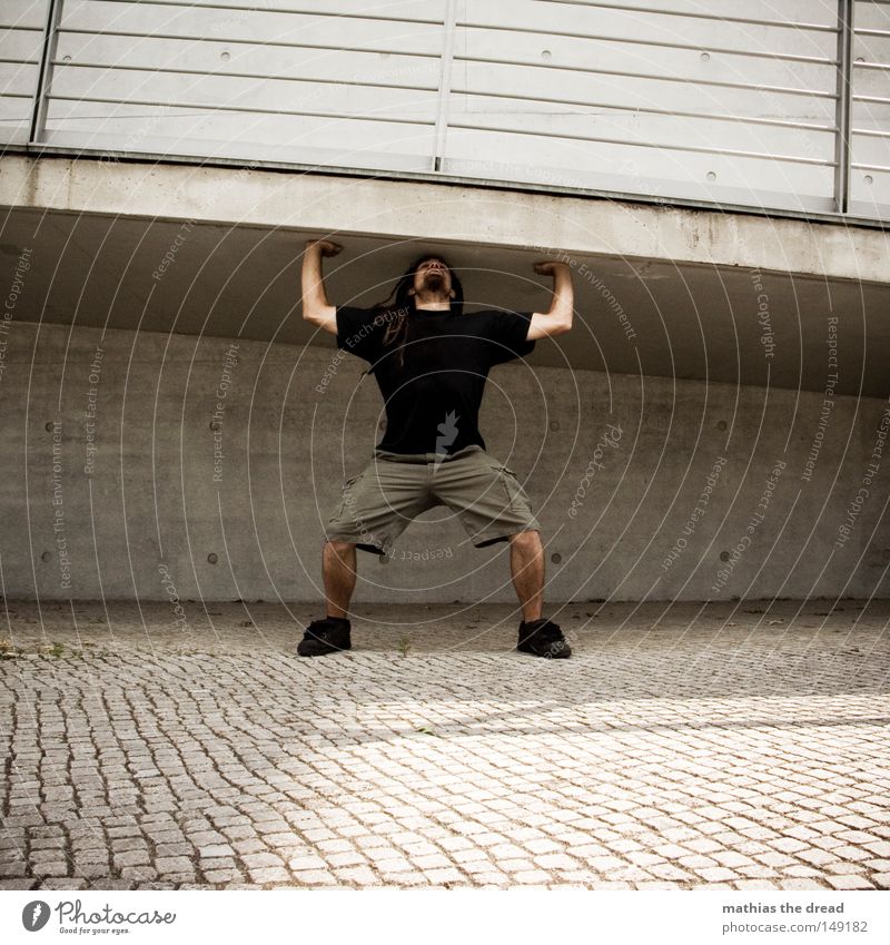 BLN 08 | I AM STRONG Weight-lifting Weight training Young man Dreadlocks Full-length Architecture Pedestrian bridge Concrete Concrete construction Effort Power