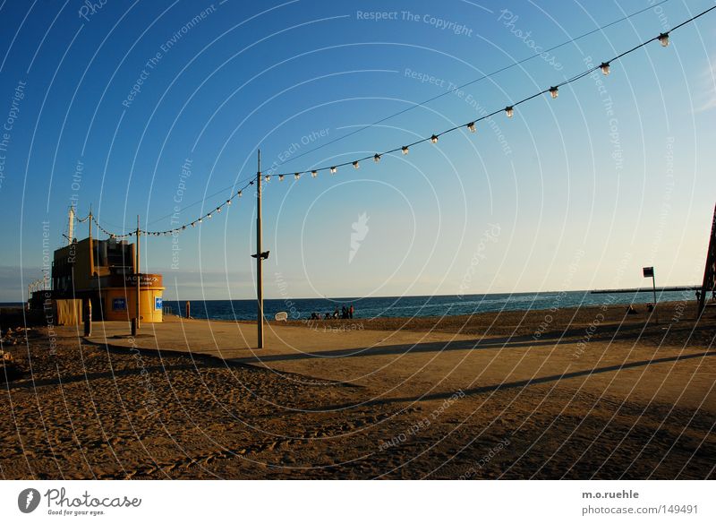 5.20 pm Barcelona Beach November Ocean Spain Fairy lights Beach bar Blue Yellow Sand Beautiful weather Autumn Coast Colour