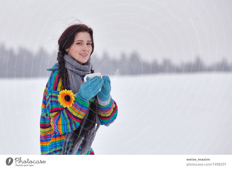 Young woman in a sweater on a winter walk Coffee Tea Mug Happy Beautiful Vacation & Travel Winter Snow Hiking Human being Youth (Young adults) Woman Adults Body