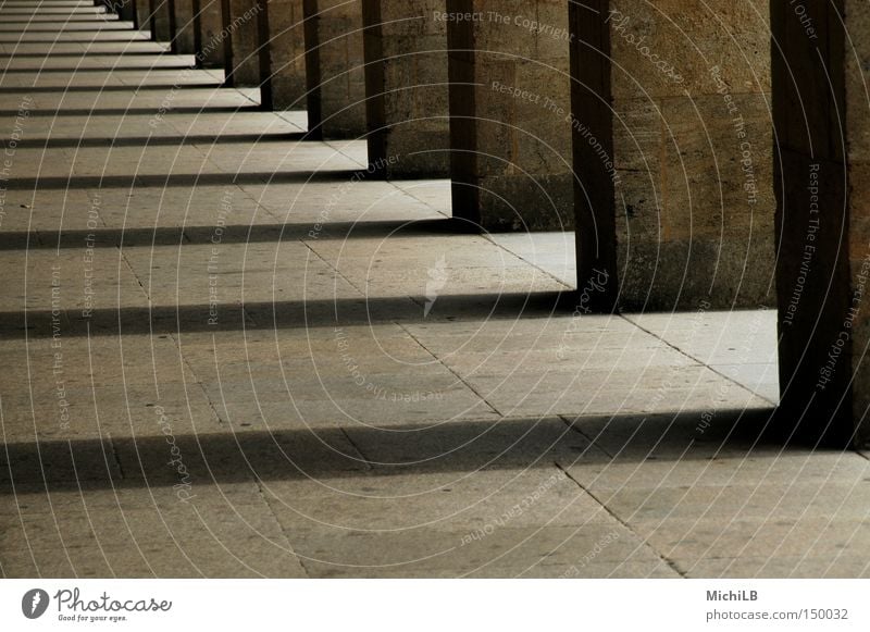 Courtyard of the temples Airport Corridor Column Stone Shadow Light and shadow Infinity Far-off places