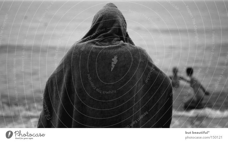 cold times Summer Beach Cold Heat Monk's habit Swimming & Bathing Ocean Towel Mysterious Eerie Coast Black & white photo Observe