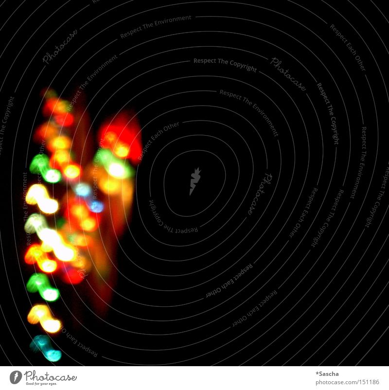 The dream begins Fairy lights Point of light Light Bright Multicoloured Calm Living room Dark Black Contrast Joy New Year's Eve Colour