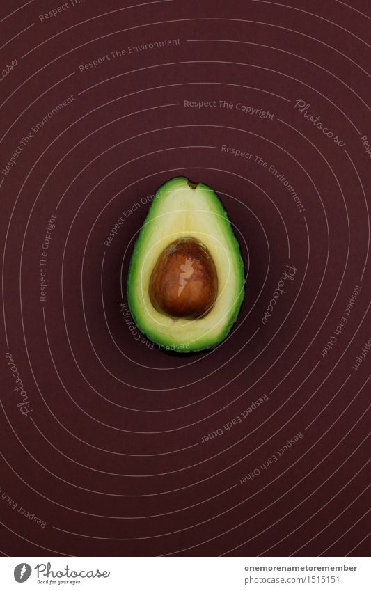 Jammy Avocado on Brown Art Work of art Esthetic Green Healthy Eating Organic produce Kernels & Pits & Stones Pomacious fruits Delicious Nutrition Food Fruit