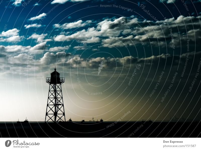 Lighthouse in Bremerhaven Beach Harbour Navigation Lamp Lighting Watercraft Clouds Sky Coast Ocean Lake Lantern Sand Sandy beach Low tide High tide