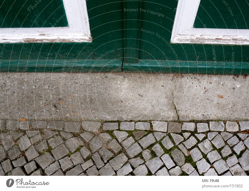 Closed. Earth Gate Door Sidewalk Traffic infrastructure Street Stone Concrete Wood Cold Gloomy Under Green Cleanliness Boredom Calm Symmetry Transience Entrance