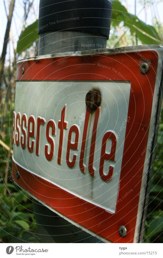 water point Red Signs and labeling Close-up selective sharpness