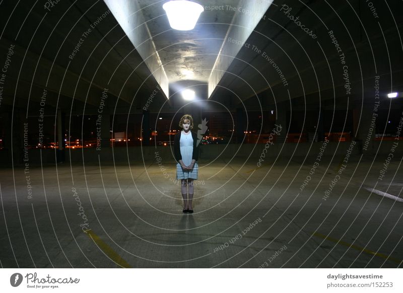 Perceptions Town Night Woman Architecture Young woman Artificial light Central perspective Parking garage Parking level Individual Isolated (Position)