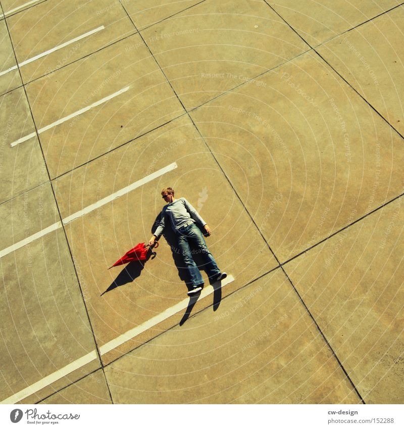 AntiVir Off Umbrella Human being Red Concrete Bird's-eye view Parking lot Parking level Beautiful weather Shadow Man Masculine Stand Lie Sunshade