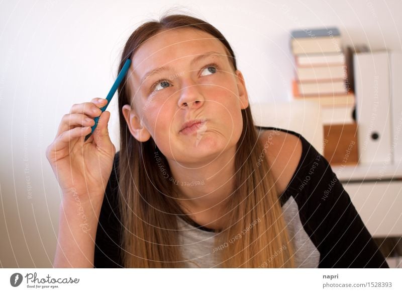 Yes, No, Maybe... | Portrait of a teenage girl scratching her head with a pencil while doing homework and thinking. Education School Student Young woman