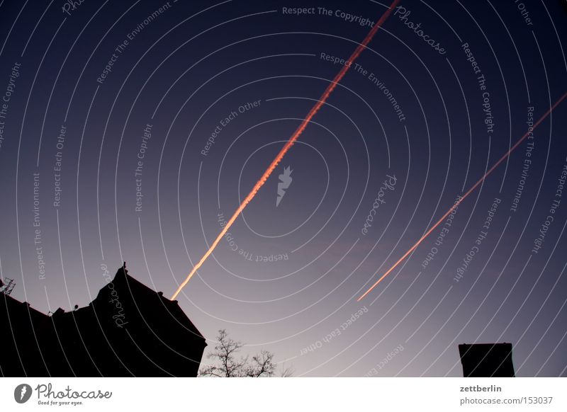 condensing Airplane Vacation & Travel Travel photography Vapor trail Parallel Together Dusk High-rise Twilight Sunset Romance House (Residential Structure) Roof