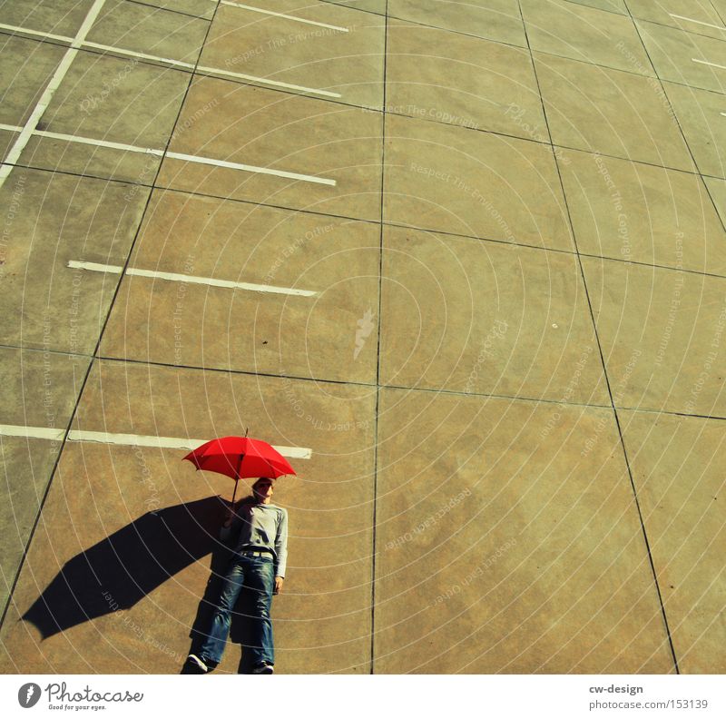 AntiVir On II Umbrella Human being Red Concrete Bird's-eye view Parking lot Parking level Beautiful weather Shadow Man Masculine Against Stand Lie Art