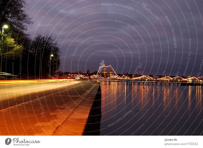 sea lights at twilight I Long exposure Motor vehicle Harbour Twilight Night Lake Water Street Light Kiel Floodlight Clouds Watercraft Panorama (View) Sky Beach