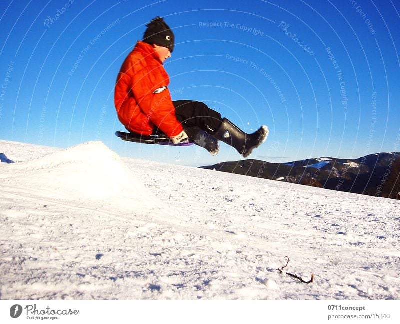 tape disc training Sledding Sleigh Winter Jump Air Snowscape Extreme sports Bobsleigh Ski jump Sky Sledge Departure Speed Lack of inhibition Reckless Blue sky