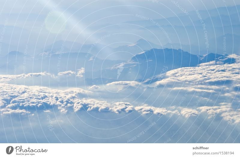 So peaceful from above II Environment Nature Landscape Sky Clouds Sunlight Winter Beautiful weather Ice Frost Snow Rock Mountain Peak Snowcapped peak Blue White