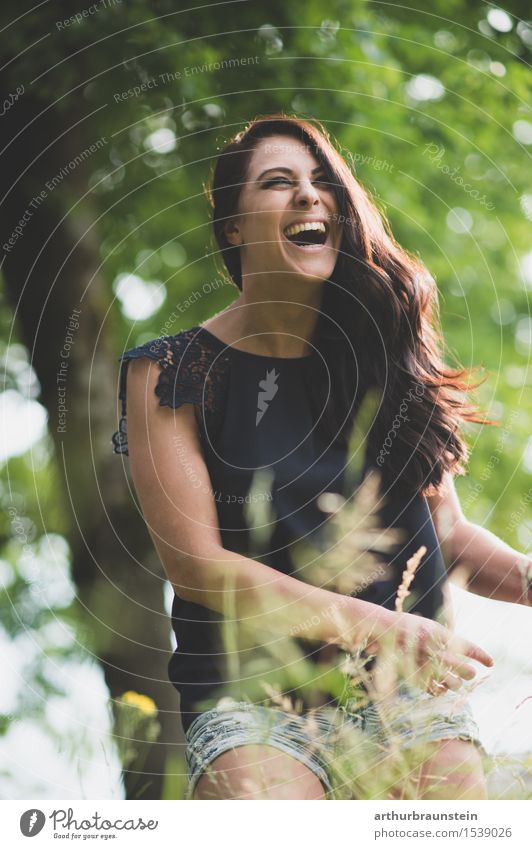 Young woman in nature Lifestyle Joy Beautiful Hair and hairstyles To go for a walk Vacation & Travel Tourism Summer Summer vacation Mother's Day Human being