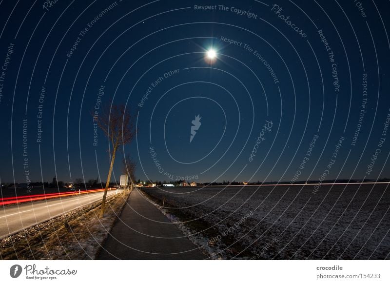 Moonlight ll Rear light Tree Distorted Street Cycle path Stars Field Agriculture Street sign Motor vehicle Snow Traffic infrastructure Macro (Extreme close-up)