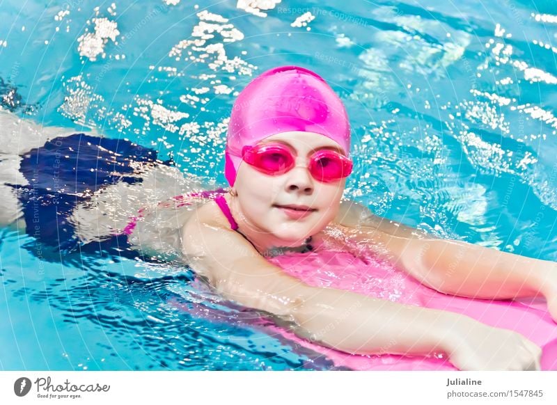 Cute girl in swimming pool Swimming pool Sports Child Schoolchild Girl Infancy 3 - 8 years 8 - 13 years Wet White kid preschooler six 7 Caucasian European water