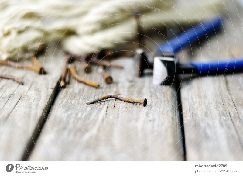 Pliers and twine on a plank with old rusty nail Work and employment Industry Tool Rope Wood Metal Steel Rust Old Build Dirty Retro Power Hope background Bent