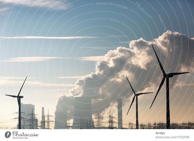 Wind turbines in front of a lignite-fired power plant Energy industry Renewable energy co2 Wind energy plant Coal power station Sky Clouds Climate change Threat