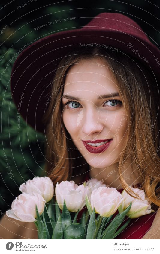 Pretty woman standing with white flowers Elegant Happy Beautiful Skin Face Make-up Spa Summer Human being Girl Woman Adults Lips Nature Sky Flower Fashion Hat